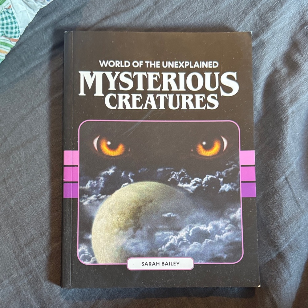 Mysterious Creatures by Sarah Bailey - Black Cover with Purple Accents
